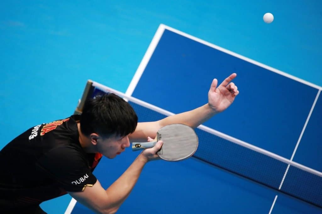 table-tennis-1208377_1920 | PingPongExperts An adult serving ball
